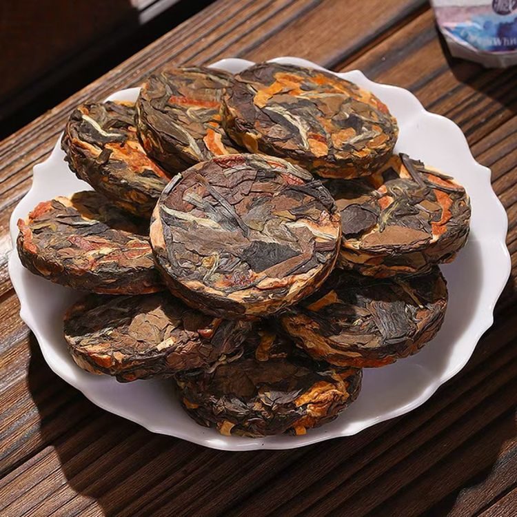 Aged tangerine peel white tea coin for citrus-rich wellness service in the UAE